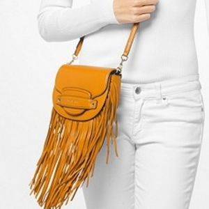 Michael Kors Cary Small Slim Fringed Limb Leather Saddle Bag in Marigold